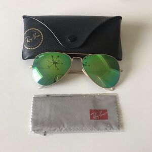 Ray-Ban aviators. Green reflective lenses.